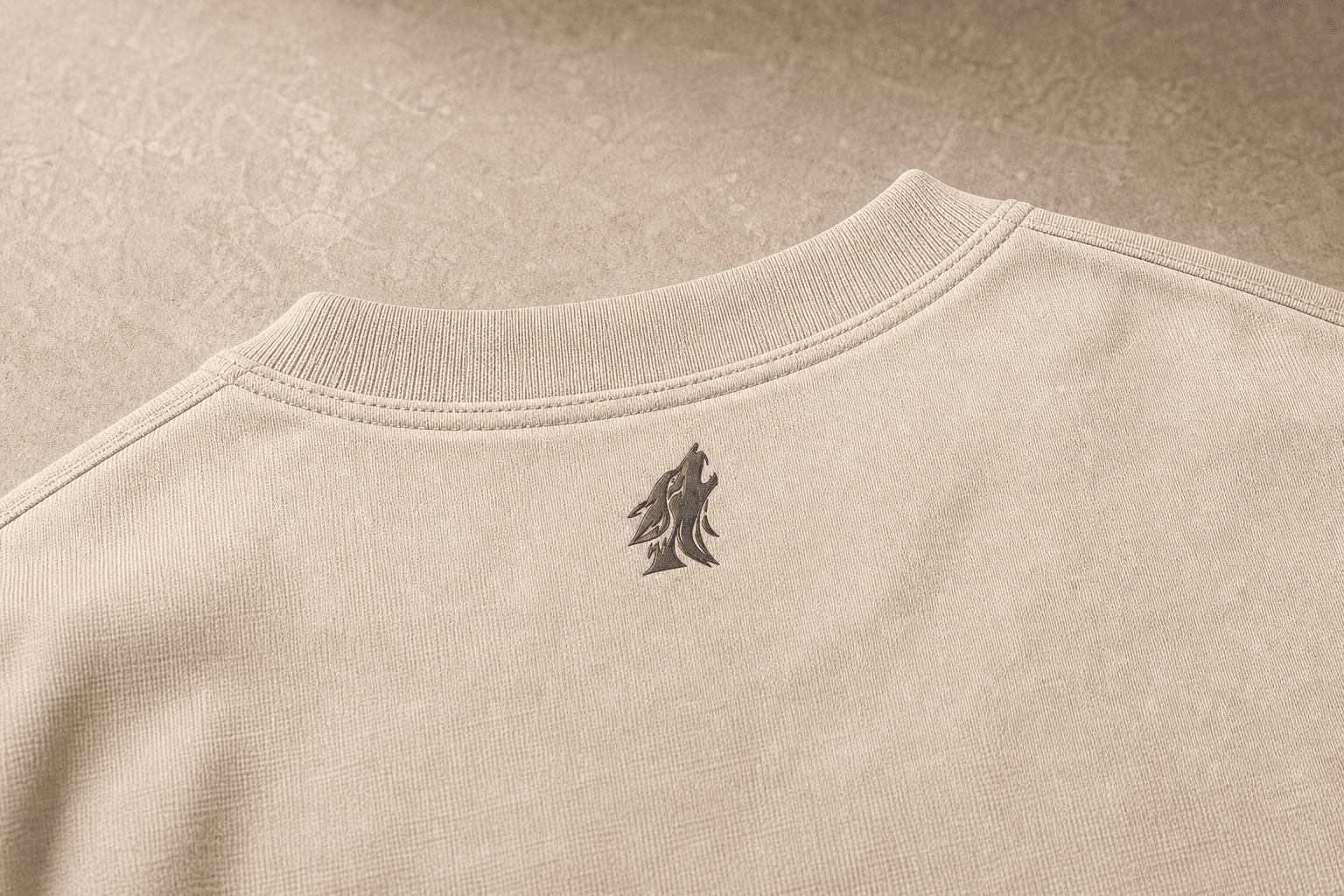 Close-up of the DYRWOLF Sand T-Shirt back collar mark